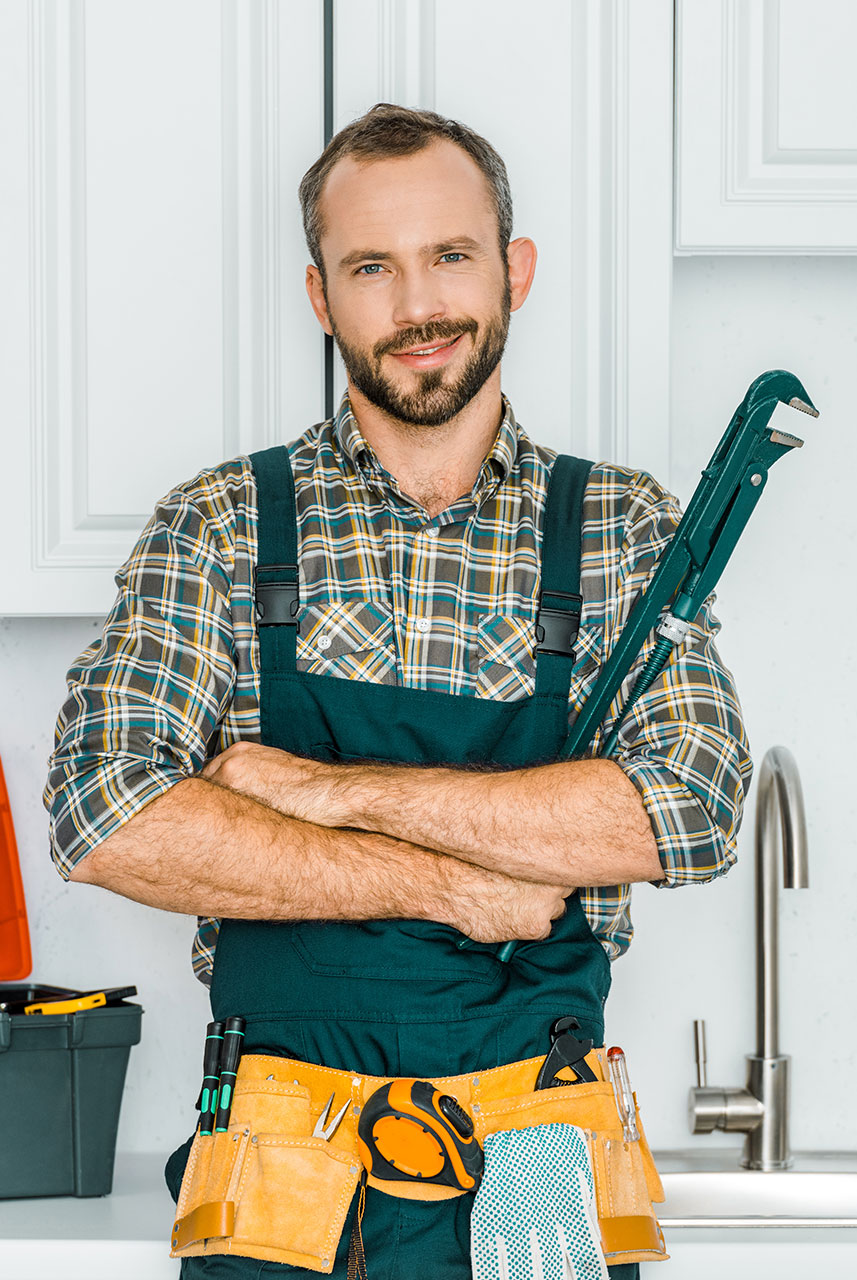handsome-plumber-holding-monkey-wrench-and-looking-2021-08-29-22-50-03-BS6CHUU.jpg
